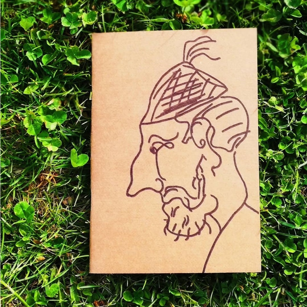 Külahlı adam çizimli defter