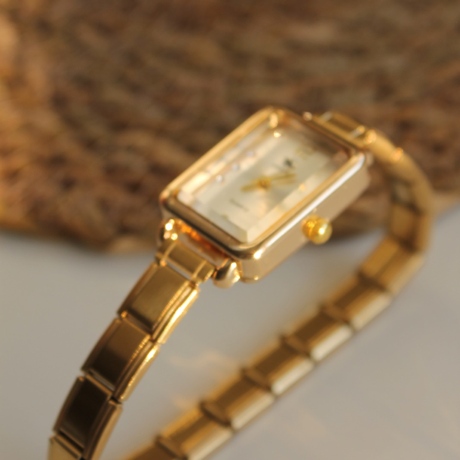 Nomi Luxe Gold Kare Kadranlı Çelik Kadın Saat