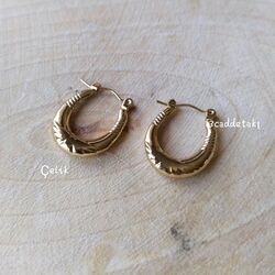 ÇELİK ÇİZGİLİ OVAL HALKA MODEL KÜPE 