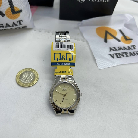 Q&Q Gold Gümüş renk kol saati 