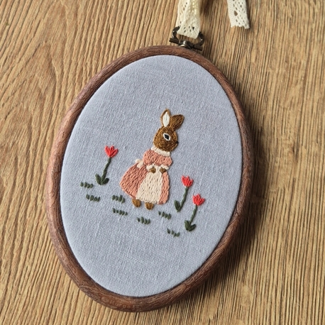 Miss bunny in tulip garden