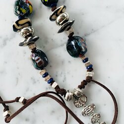 Long leather necklace with silver & millefiori details