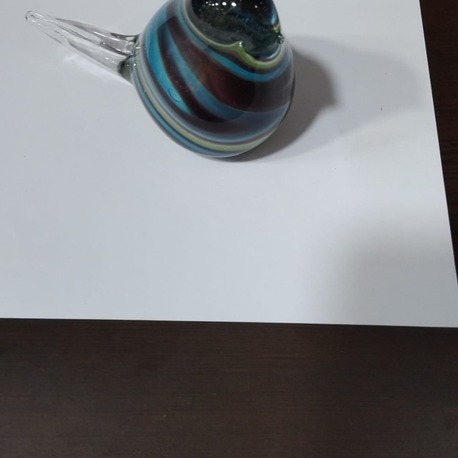 E104226042026 En..12 cm. H.8.5 cm. cam el yapımı kuş 1 adet