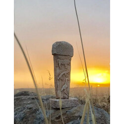 göbeklitepe: boğa, tilki , turna kabartması  