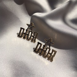 Gold Dior küpe