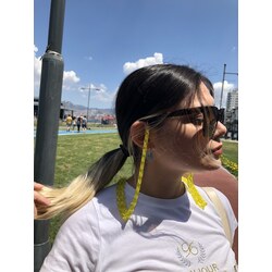 Sarı akrilik gözlük askısı