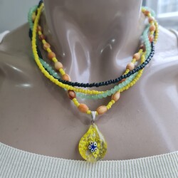 Dört sıra sarı murano kolye