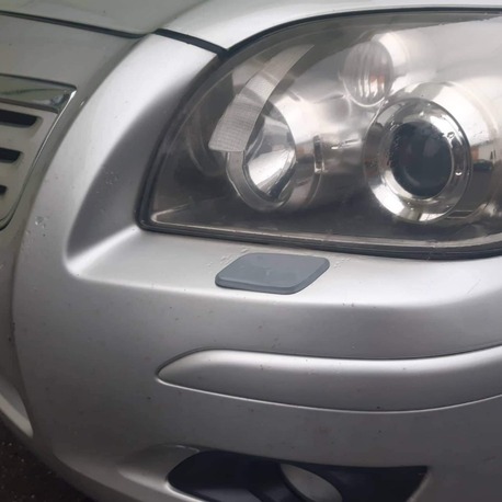 Toyota Avensis far yıkama kapağı sol 85045-05050