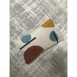 ‘mini geometric pillow’