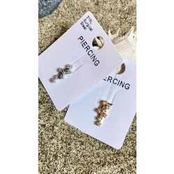 Çelik takım yıldızı piercing