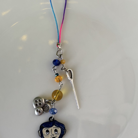 Coraline phone charm 
