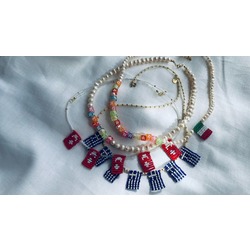 Una Faccia Una Razza Necklace