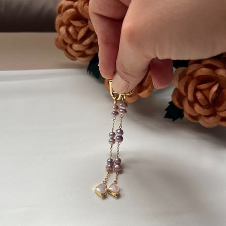 The Enamelled Shine Of Lavender Pearl Love Earrings