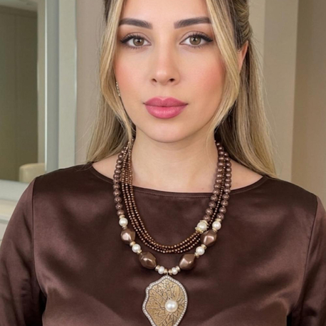 Bronz inci detaylı lav taşı özel tasarım kolye 