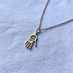 mano espiral kolye