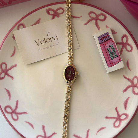 Gold bordo luris saat