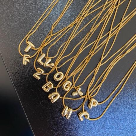 gold mini bubble harf kolye | çelik