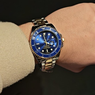 Rolex-Mavi Saat Gümüş Ve Altın Detaylı