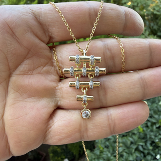 Geometrik Formlu Zirkon Taşlı Gold Çelik Kolye