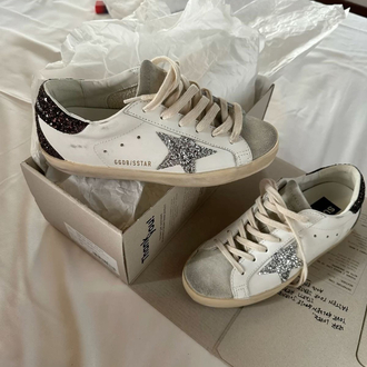 Golden Goose Super-Star with silver star and black glitter heel tab