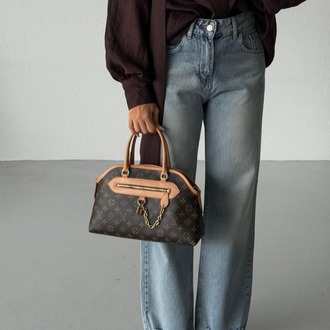 LOUIS VUITTON Deri İthal Çanta Paslanmaz Çelik malzeme kullanarak tasarlanmıştır
