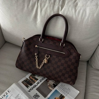 LOUIS VUITTON Deri İthal Çanta Paslanmaz Çelik malzeme kullanarak tasarlanmıştır