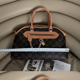 LOUIS VUITTON Deri İthal Çanta Paslanmaz Çelik malzeme kullanarak tasarlanmıştır