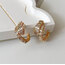Serpenti model gold küpe 