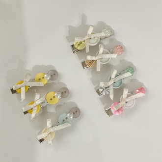 Button hair clips 