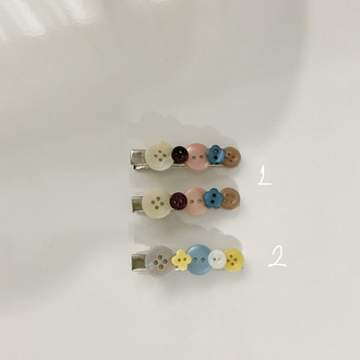 Button hair clips