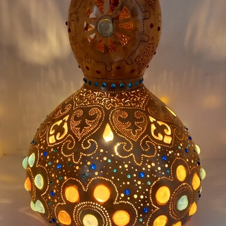 Osirisin gözü su kabağı lambası