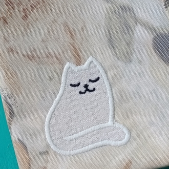 beyaz aplike kedi kitap çantası