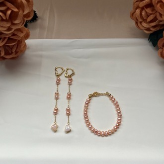 The Enamelled Shine Of Peach Pearl Love Earrings