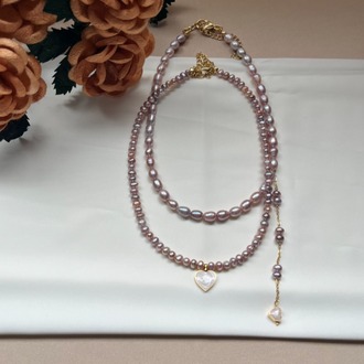 The Enamelled Shine Of Lavender Pearl Love Necklace