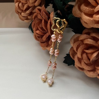 The Enamelled Shine Of Peach Pearl Love Earrings