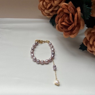 The Enamelled Shine Of Lavender Pearl Love Bracelet