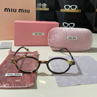 Miu Miu oval kadın leopar detaylı optik gözlük