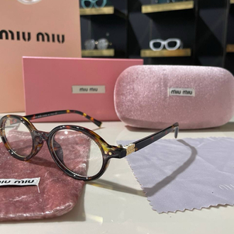 Miu Miu oval kadın leopar detaylı optik gözlük