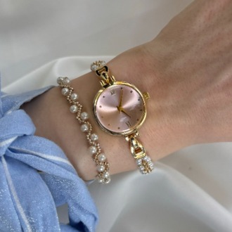 İncili Saat