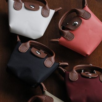 petit bag charm - burnt orange