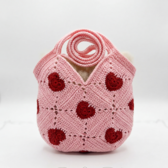 Pembe çocuk kol çantası