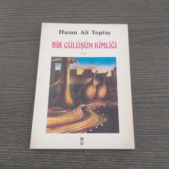 Hasan Ali Toptaş - Bir Gülüşün Kimliği (İmzalı)