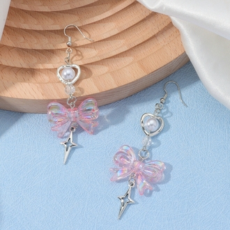 Coquette pembe fiyonk detaylı küpe