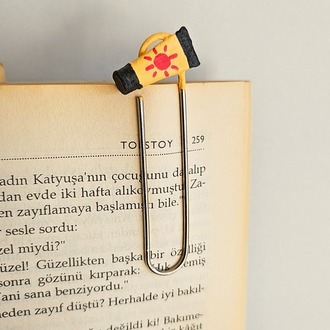 GÜNEŞ KREMİ KİTAP AYRACI