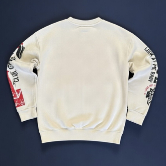Fearless 88 Racing pullover. Krem tonu, baskılı kollar, rahat ve şık.