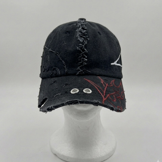 red and white tribal design cap