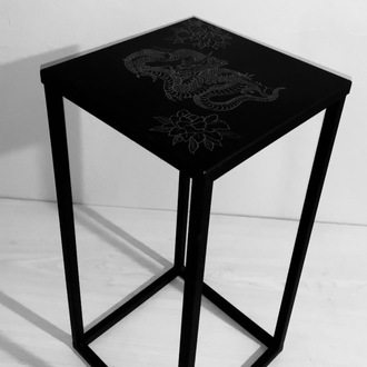 Custom engraved metal unique table.