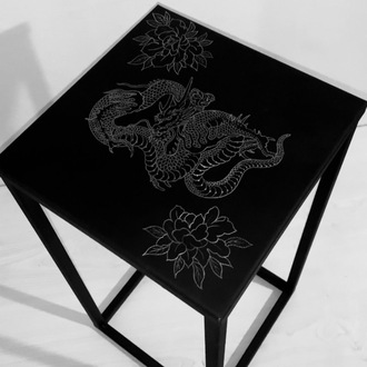 Custom engraved metal unique table.