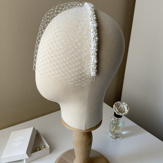 Pearly Vualet