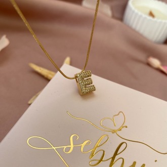 gold taşlı harf kolye | çelik